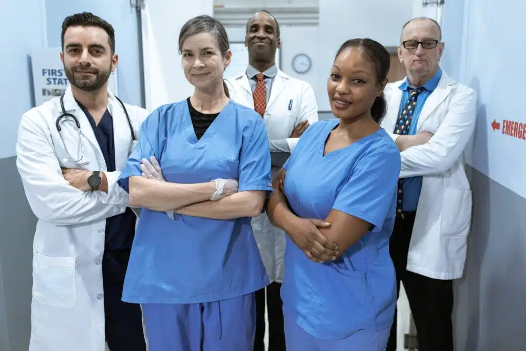 Group Of Doctors And Nurses Smiling