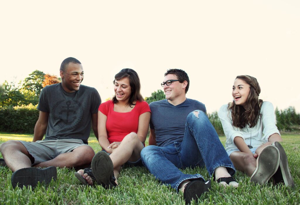 Group Of Young People Smiling And Looking Happy