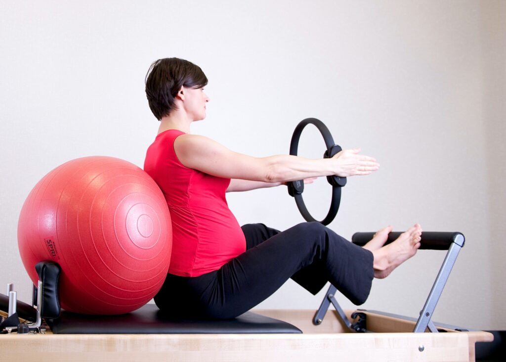 Pregnant Woman Exercising.Kegel Exercises For Women