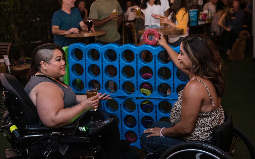 Two disabled people playing connect 4.
Unlocking Independence: How Wheelchairs Empower Individuals with Mobility Challenges