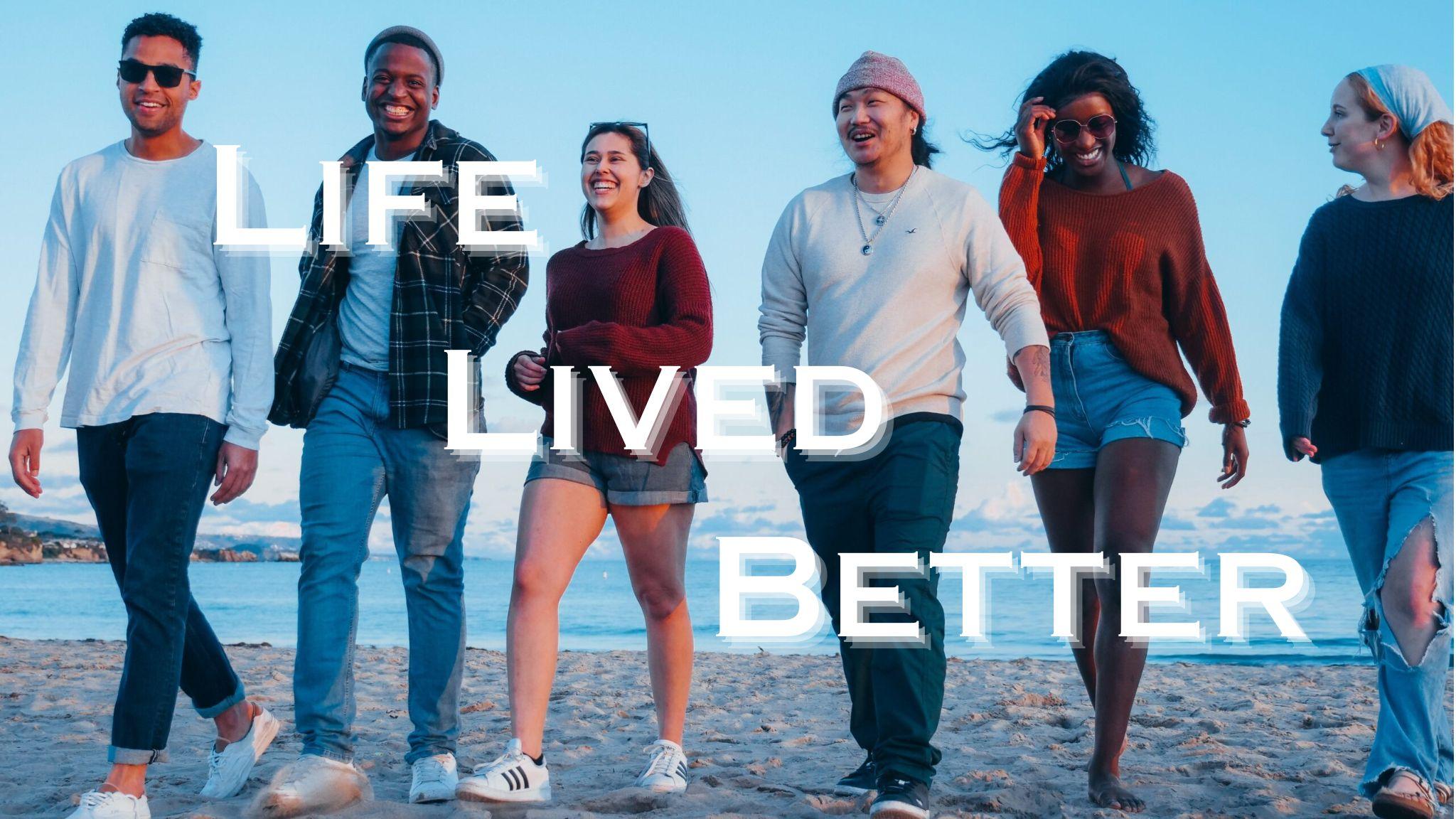 Group Of Happy Young People On Beach. www.lifelivedbetter.co.uk